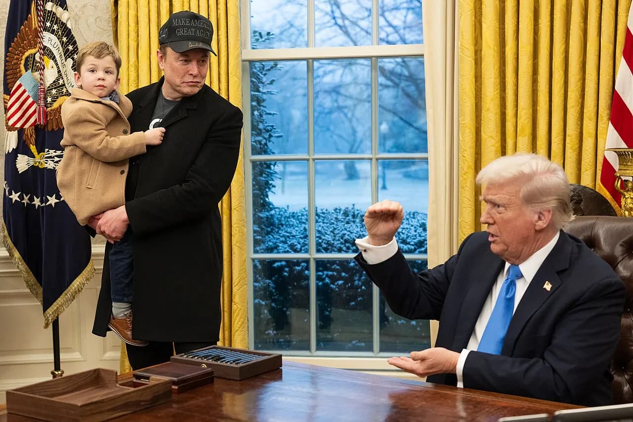 President Donald Trump signs executive orders with Elon Musk and his son on Tuesday, February 11, 2025, in the Oval Office of the White House. (Official White H