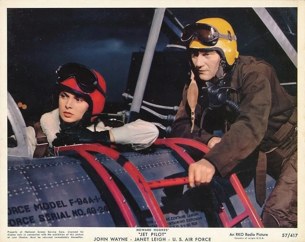 Janet Leigh and John Wayne in Jet Pilot (1957). Vintage 1957 8x10 color photo issued by RKO studio for the film classic Jet Pilot.