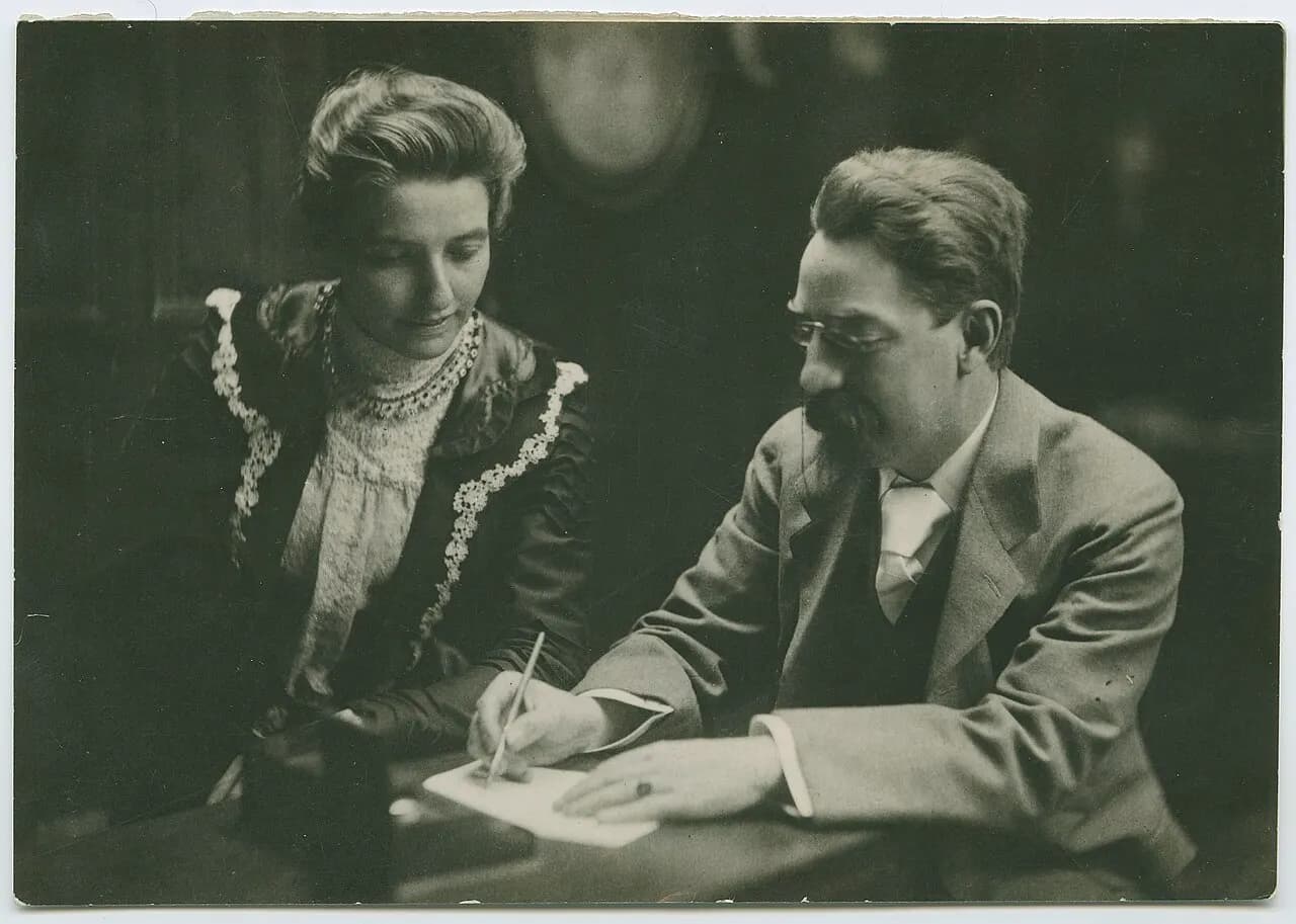 Beatrice and Sidney Webb working together at a table. Published in the second volume of Beatrice Webb's autobiography, Our Partnership (1948). Martha Beatrice W